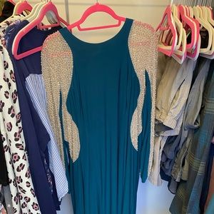 Really nice ball gown. Worn once for a Mardi Gras ball.